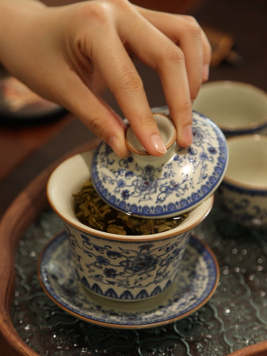 Blue and white Ru kiln Sancai covered bowl teacup